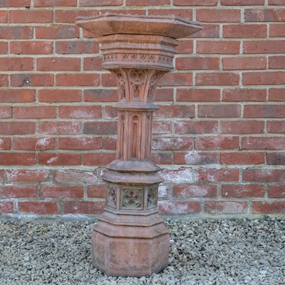 Lot 1154 - A hexagonal cast reconstituted stone terracotta coloured birdbath