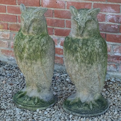 Lot 1155 - A pair of antique reconstituted stone owl sculptures