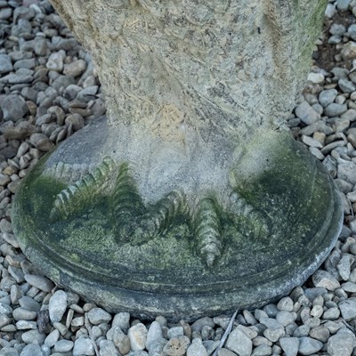 Lot 1155 - A pair of antique reconstituted stone owl sculptures
