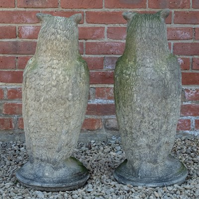 Lot 1155 - A pair of antique reconstituted stone owl sculptures
