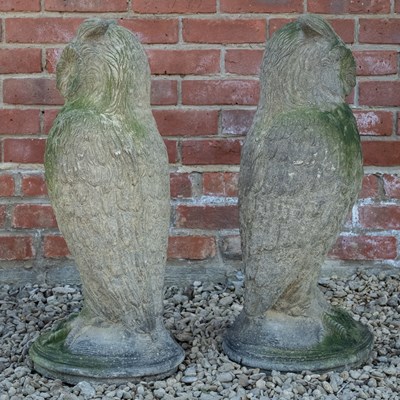 Lot 1155 - A pair of antique reconstituted stone owl sculptures