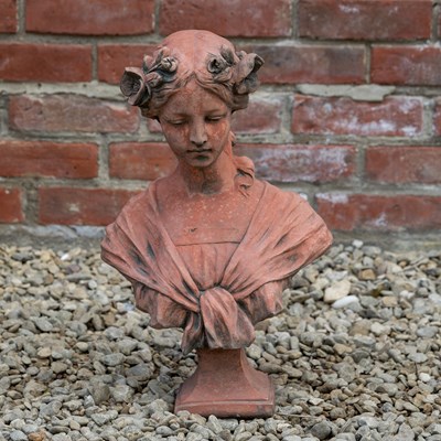 Lot 1170 - An Art Nouveau cast stone terracotta style bust