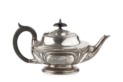 Lot 763 - A George V silver teapot, of oval form with...