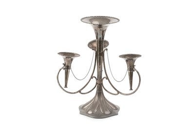 Lot 764 - A George V silver epergne, the central flared...