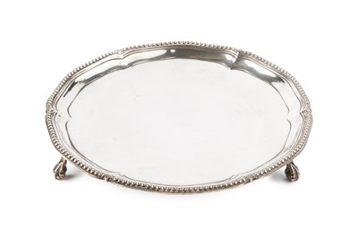 Lot 768 - A George III silver waiter, with shaped and...