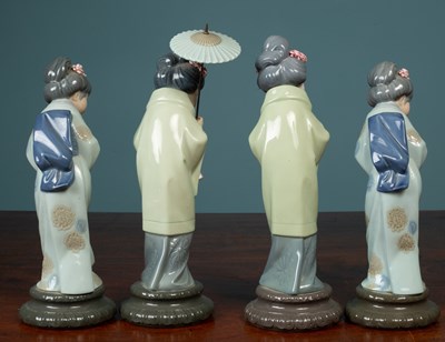 Lot 3 - A group of porcelain and glassware to include Lladro, Royal Crown Derby, Dartington and Waterford