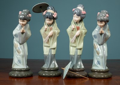 Lot 3 - A group of porcelain and glassware to include Lladro, Royal Crown Derby, Dartington and Waterford
