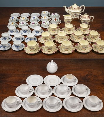 Lot 128 - A group of various pottery tea services