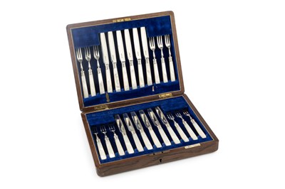 Lot 748 - A set of twelve George V silver dessert knives...