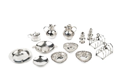 Lot 750 - A collection of silver items, comprising a...