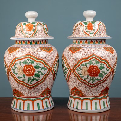 Lot 414 - A pair of Chinese lidded floor vases