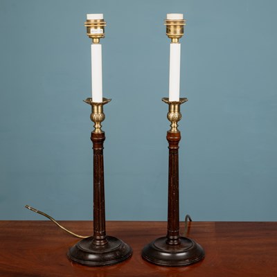 Lot 440 - A pair of Georgian style wooden fluted 'candlestick' lampstands