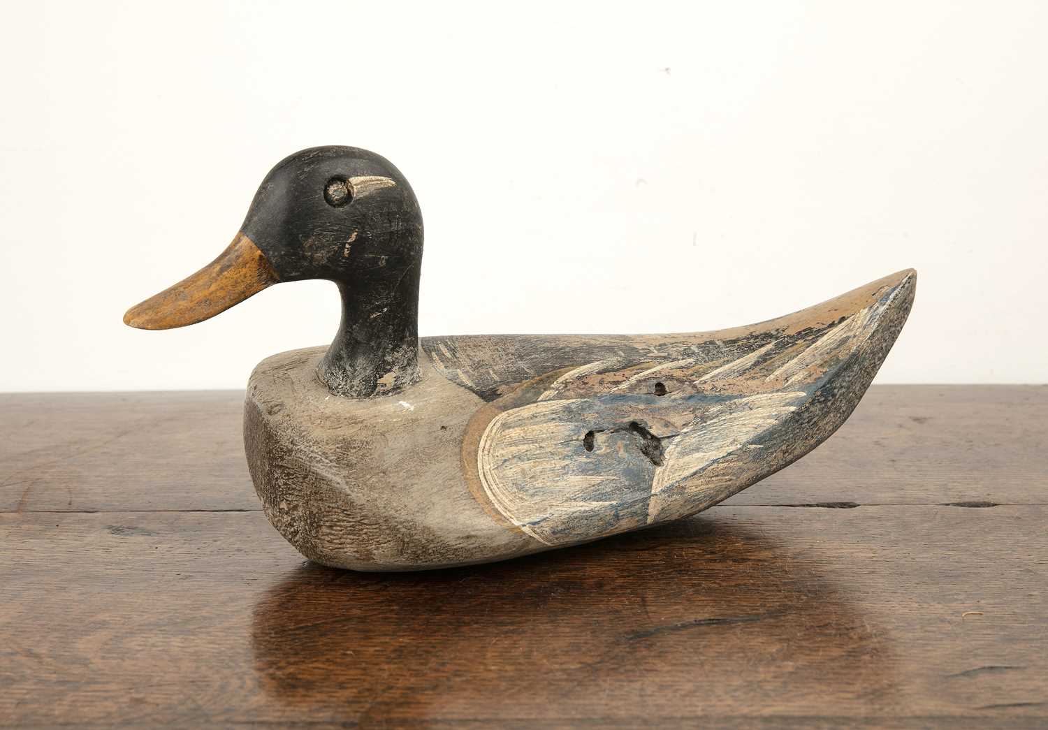 Lot 100 - Decoy duck 20th Century, carved wood, with