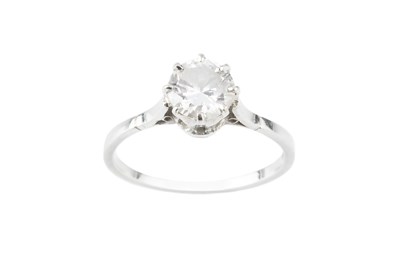 Lot 106 - A diamond single stone ring, the round...