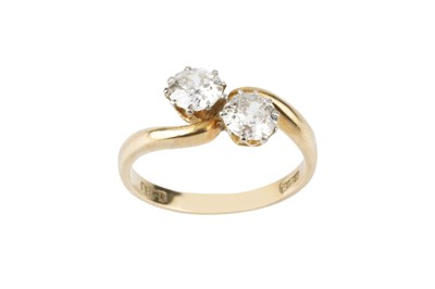 Lot 42 - A diamond two stone crossover ring, obliquely...