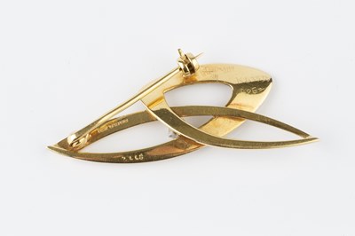 Lot 9 - A diamond set panel brooch, of abstract...