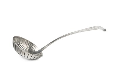 Lot 785 - A George III Irish silver soup ladle, with...