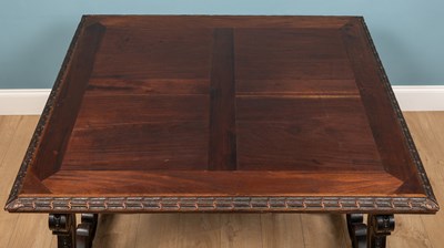 Lot 173 - A Spanish Baroque Revival walnut dining table