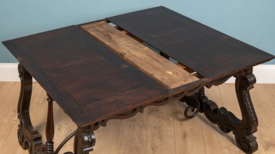 Lot 173 - A Spanish Baroque Revival walnut dining table