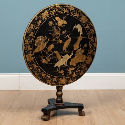 Lot 197 - A 19th century chinoiserie tilt-top circular occasional table