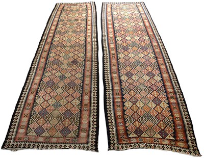 Lot 280 - A near pair of antique polychrome Kilim rugs...