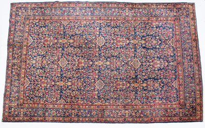 Lot 1064 - A 20th century Persian style blue ground carpet