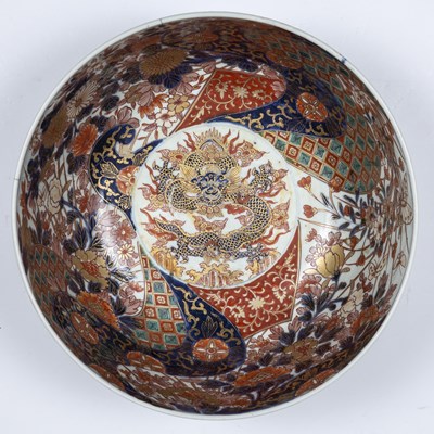 Lot 235 - A 19th century Imari punch bowl, 31cm diameter,...