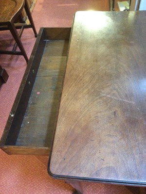 Lot 98 - A Georgian mahogany side table with a single...