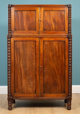 Lot 379 - A 19th century mahogany cupboard