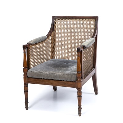 Lot 195 - An early 19th century mahogany Bergere open...