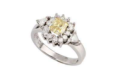 Lot 172 - A diamond cluster ring, centred with a radiant-...