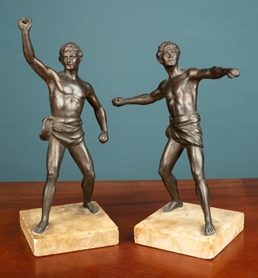 Lot 175 - A pair of French Art Deco-style bronzed effect spelter athletes