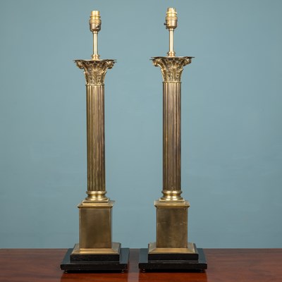 Lot 571 - A pair of large corinthian table lamps