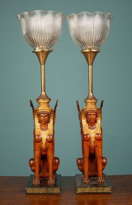 Lot 472 - A pair of French art deco empire gilded Sphinx table lamps