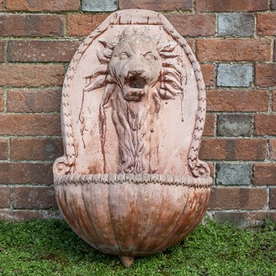 Lot 1115 - A terracotta wall fountain