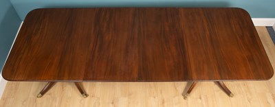 Lot 499 - A modern mahogany dining table