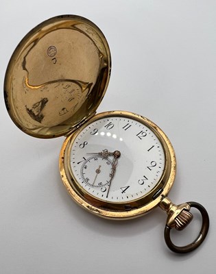 Lot 209 - A hunter pocket watch, the white enamel dial...