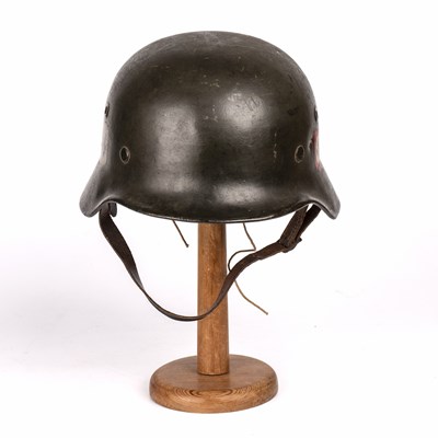 Lot 160 - A German World War II SS helmet stamped '22163'...