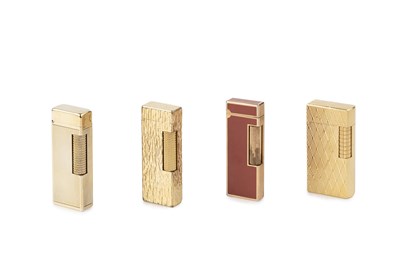 Lot 554 - A Dunhill gold plated lighter, with textured...