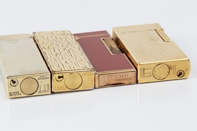 Lot 554 - A Dunhill gold plated lighter, with textured...