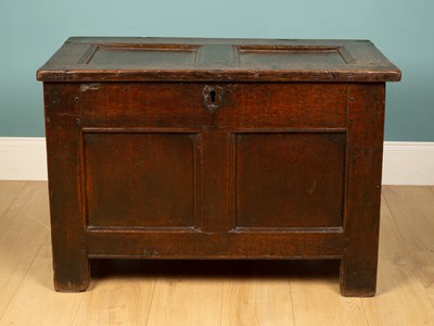 Lot 328 - An antique oak coffer