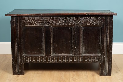 Lot 301 - An antique coffer with a triple panel front