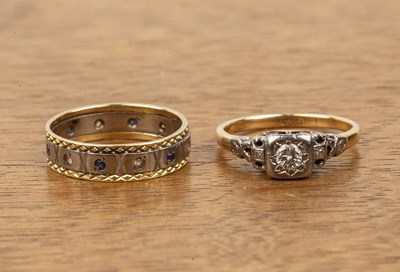 Lot 395 - Two 18ct gold rings one a solitaire diamond in...