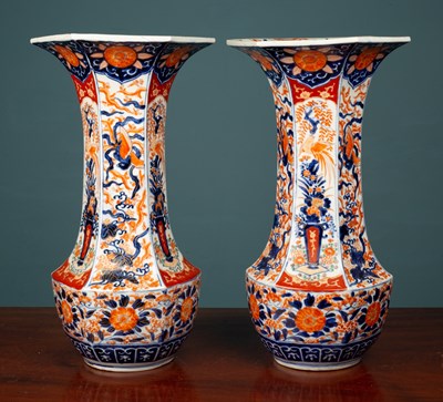 Lot 556 - A pair of large Imari style vases