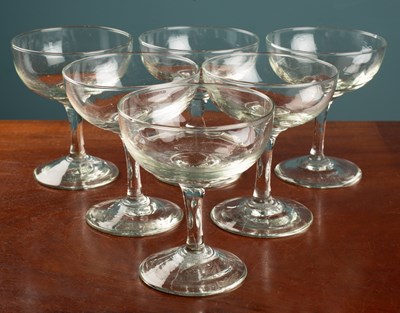 Lot 215 - A set of six champagne glasses