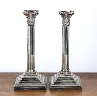 Lot 383 - Pair of silver plated candlesticks of...