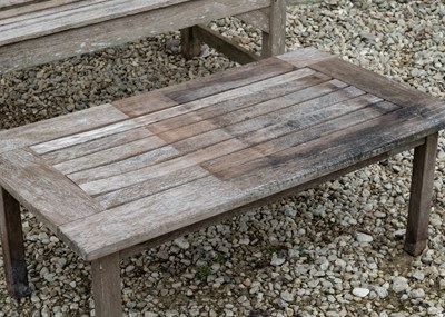 Lot 1127 - An R A Lister teak garden bench