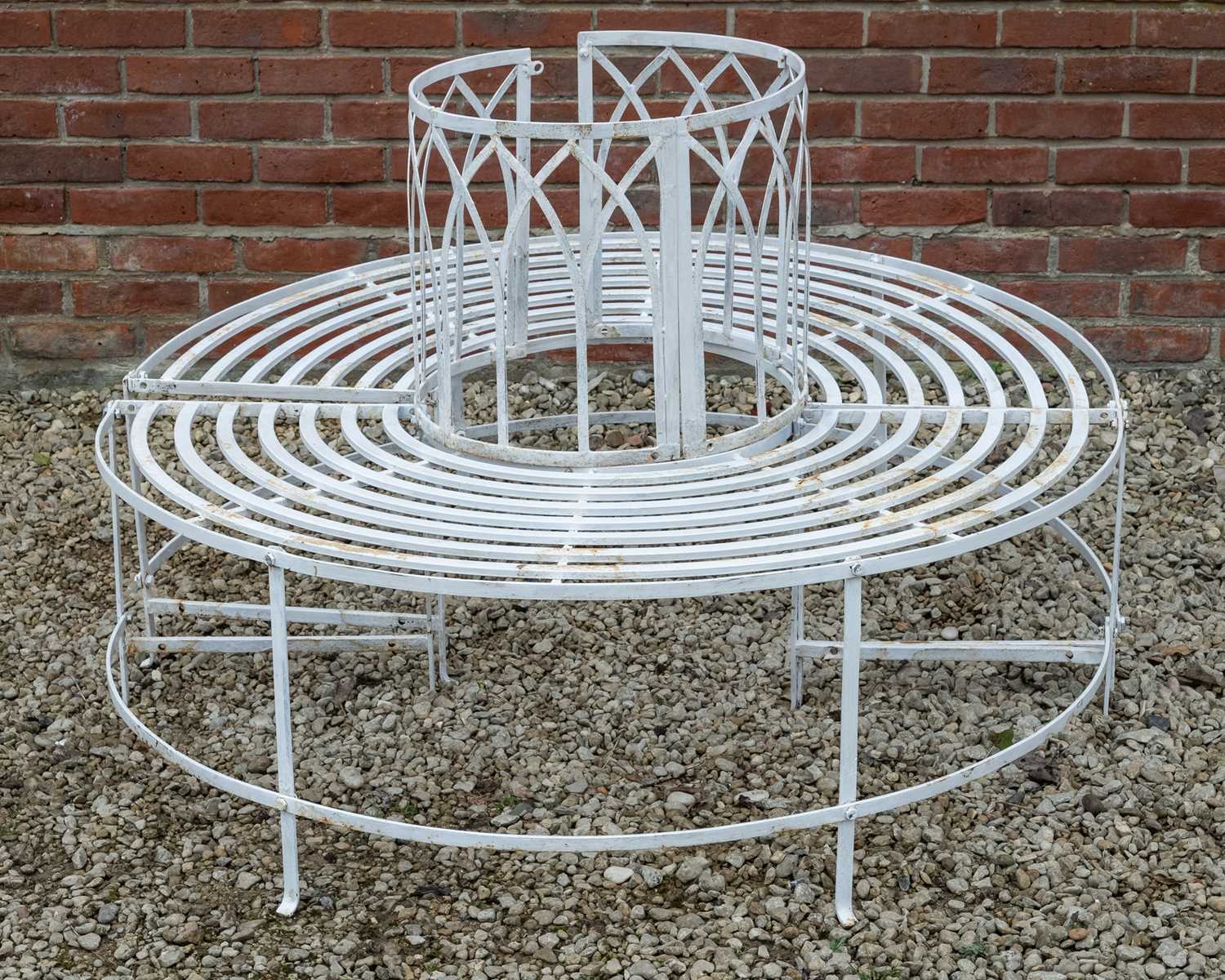 Lot 1203 - A modern white painted wrought iron circular tree bench