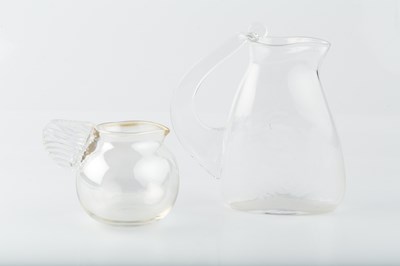 Lot 722 - Steven Newell (b.1948) Two jugs clear glass...