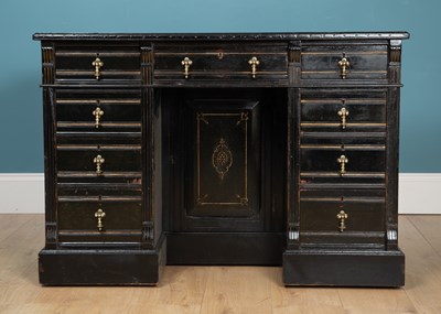 Lot 554 - A Victorian ebonised desk